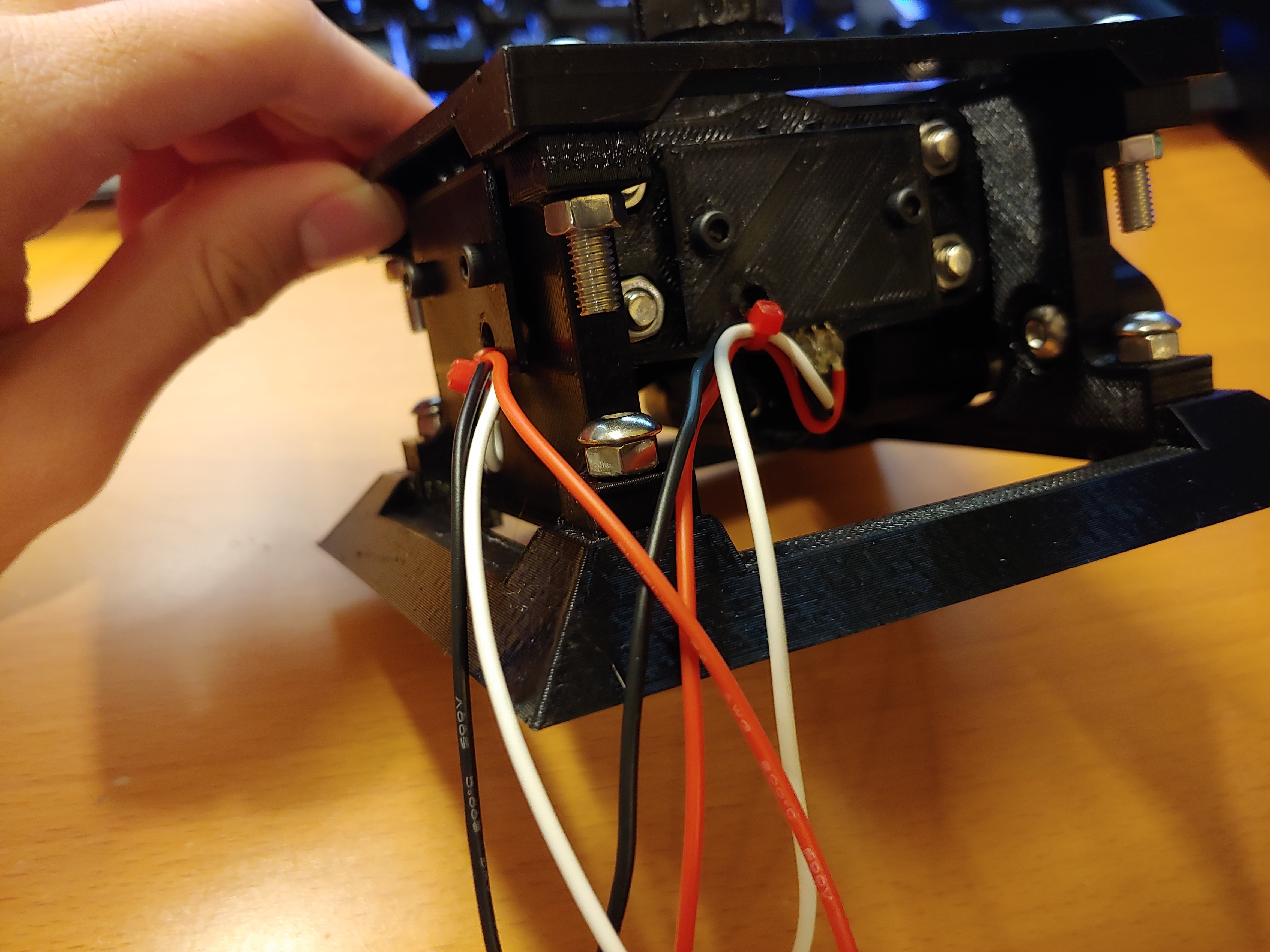 With additional hot glue for strain relief